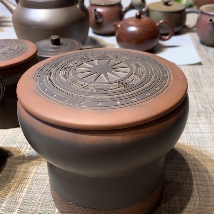 坭兴陶半斤罐铜鼓款一个