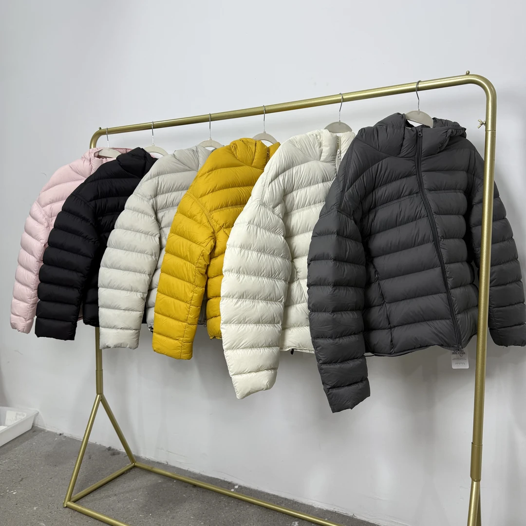 9885排骨羽绒服时尚保暖宽松型常规厚款连帽超轻羽绒服