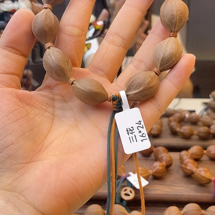 咿***咿橄榄核吊坠梅林铁核