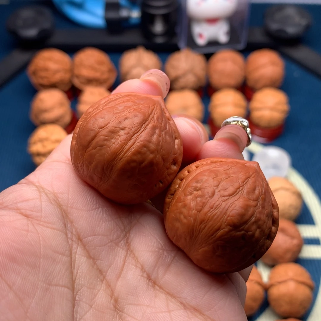 文玩核桃把件郁*子寿桃