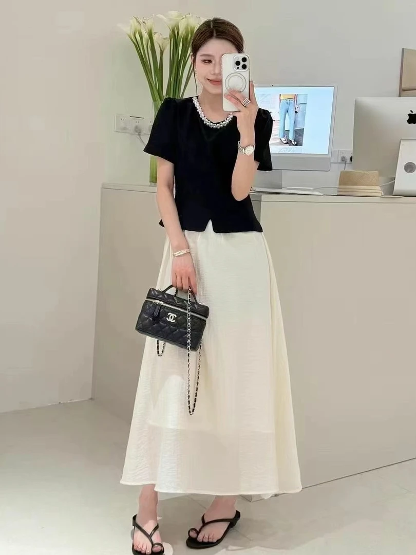 温柔风气质黑色珍珠泡泡袖开叉上衣女2025夏季设计感法式短袖套裙