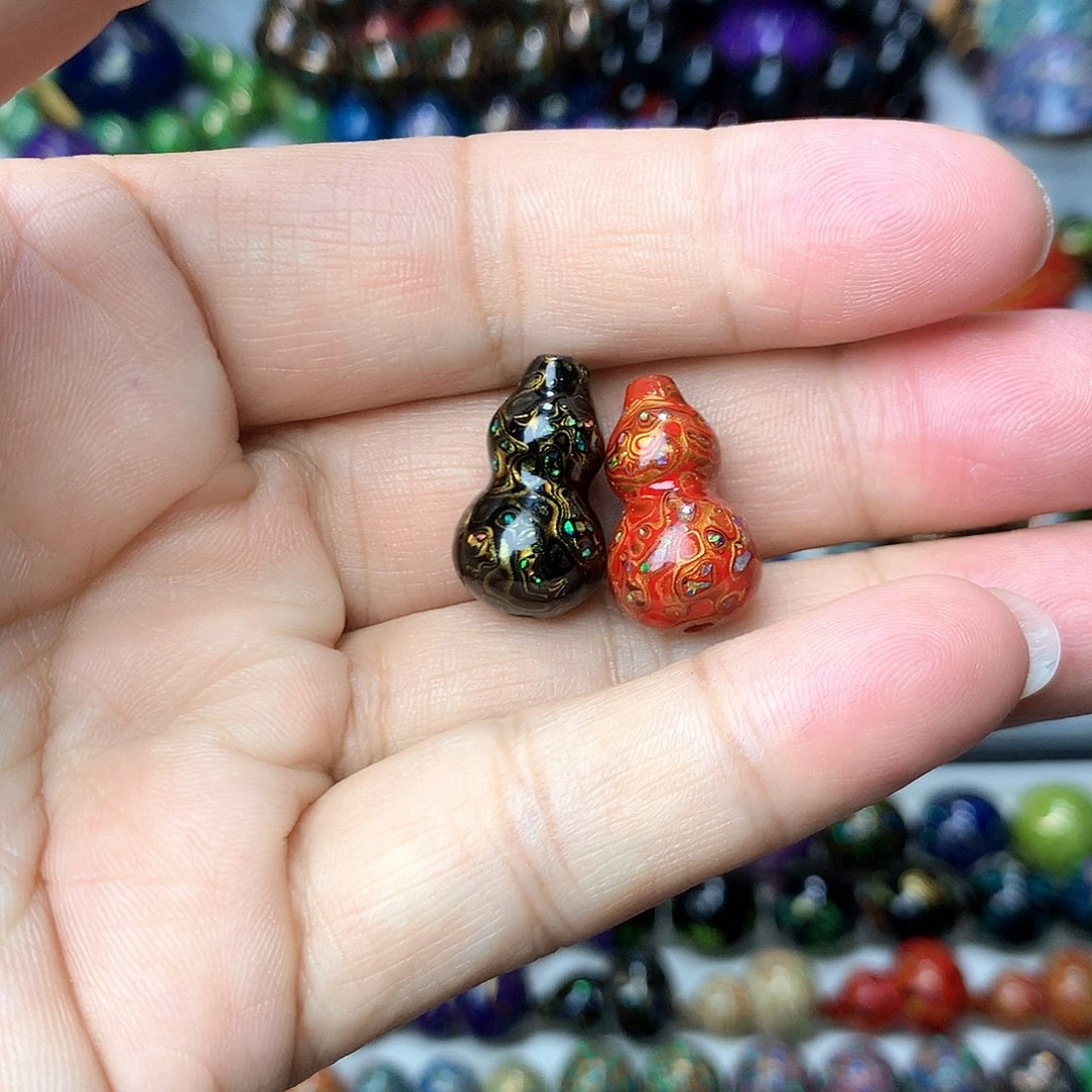 陈*彦两个大漆欧珀小葫芦