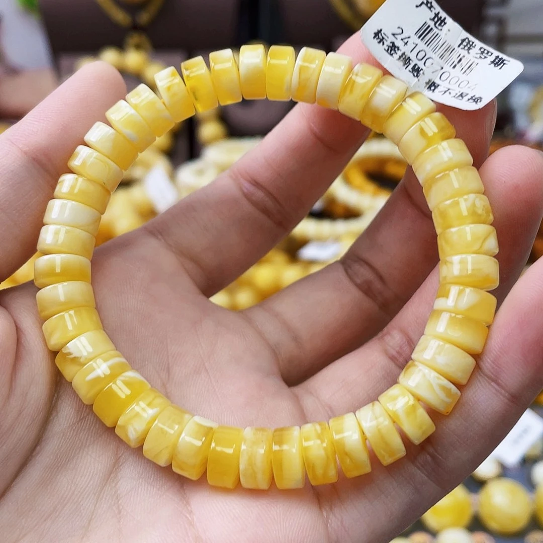 未镶嵌琥珀珠宝奇石8+mm金瓷白妖花 瑕