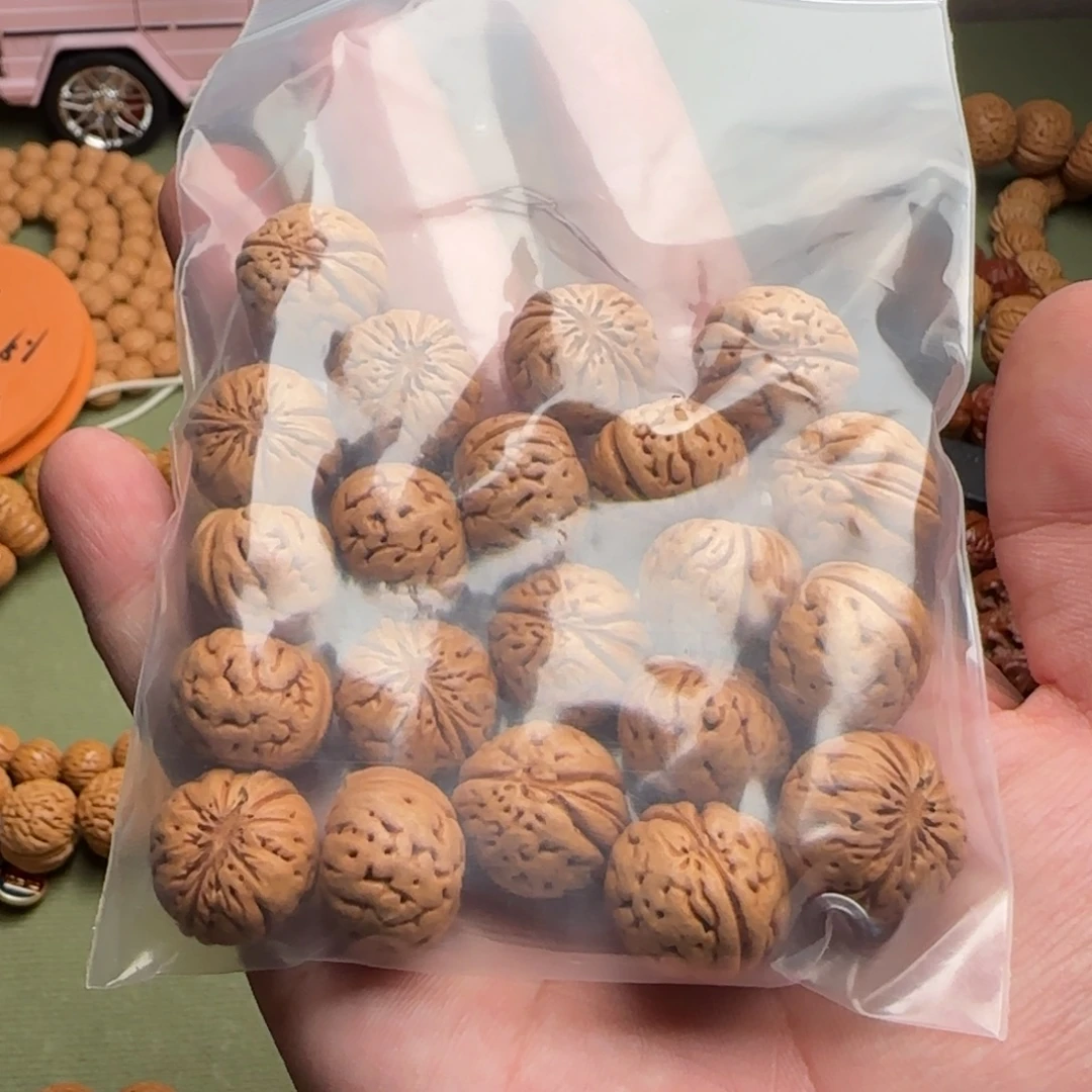 隔***宋手串桃核树王纽扣桃核手串定制款