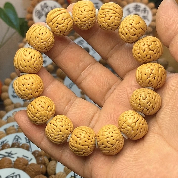 【闪购商品】几**鹿桃核盘锦肌肉手串