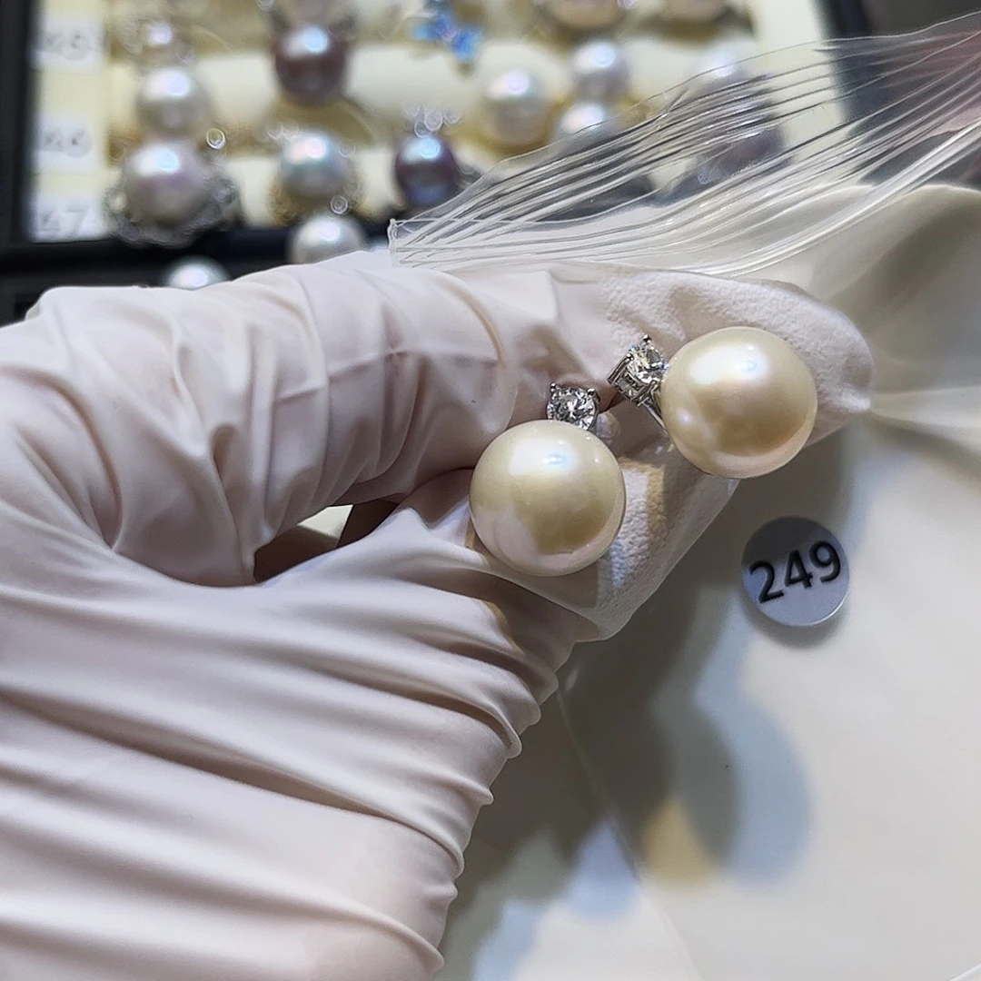 橘****淡水珍珠耳饰银S925镶嵌