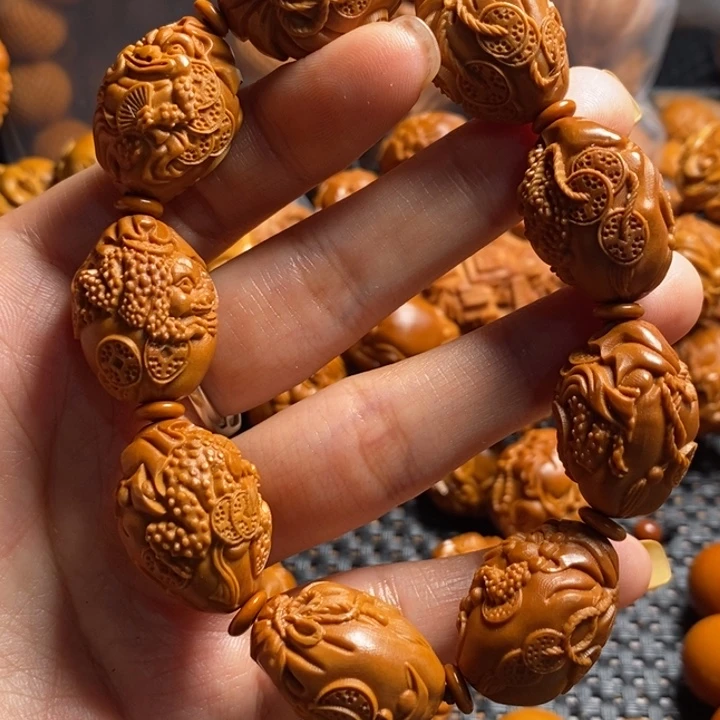 橄榄核吊坠金蟾手串