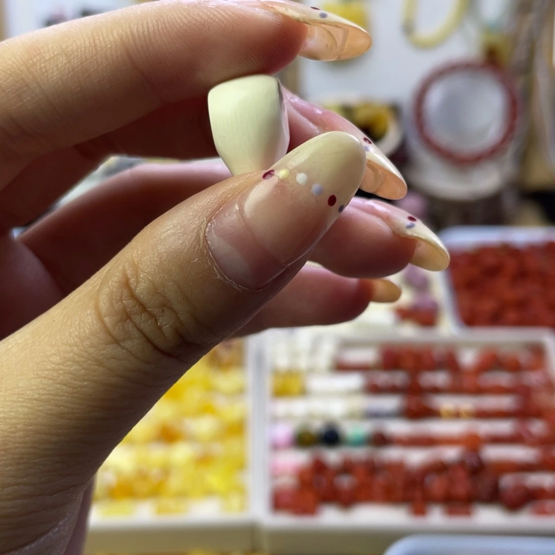 阿****力三通配珠手工艺手工制作