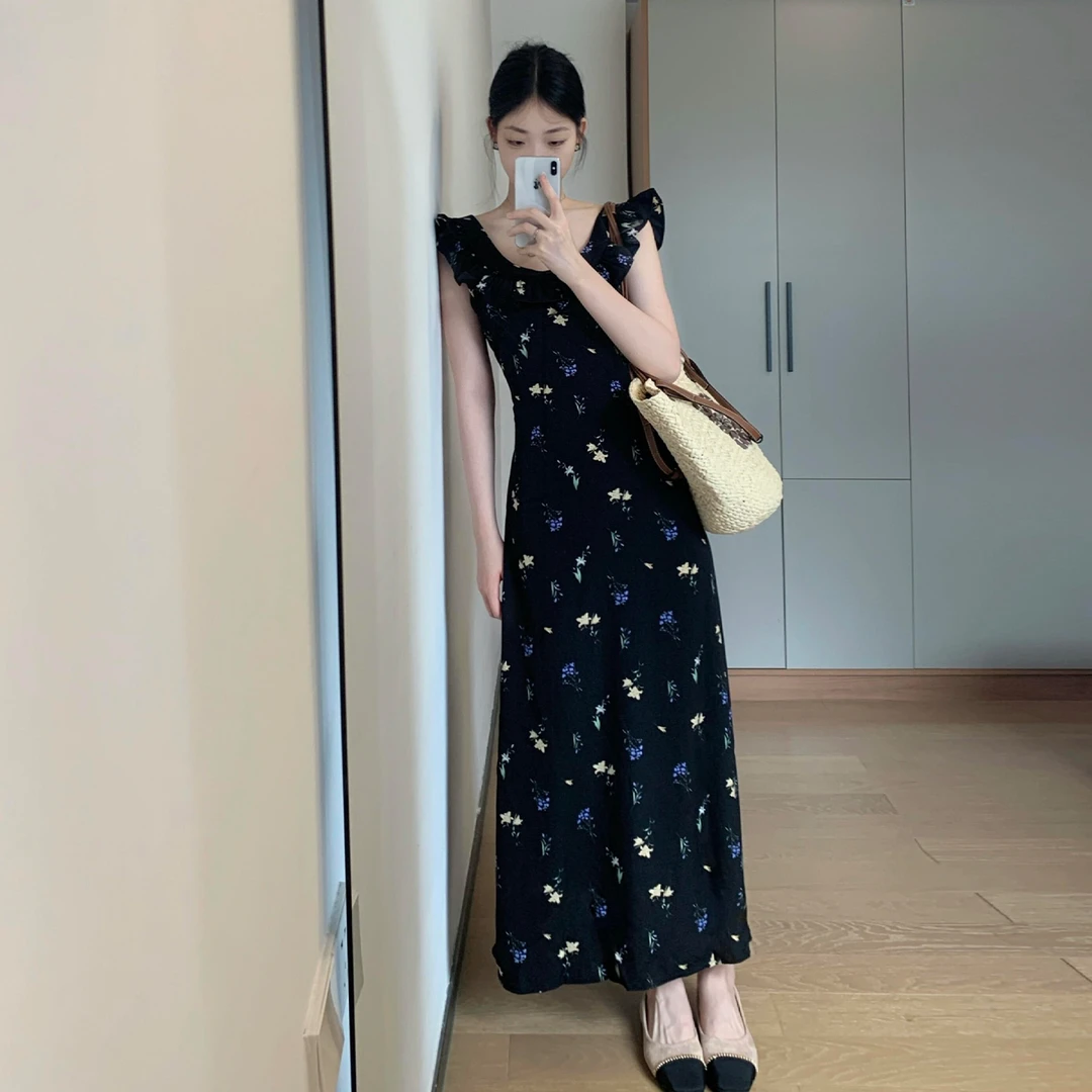法式小飞袖黑色碎花吊带连衣裙子女夏季2025新款海边度假气质长裙