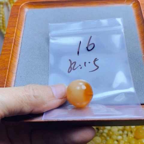 陈***柚琥珀未镶嵌戒指天然蜜蜡微乘20.7圆珠