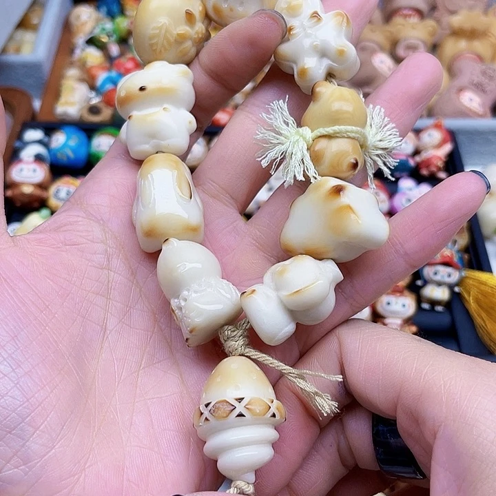 库克手串牙果手持