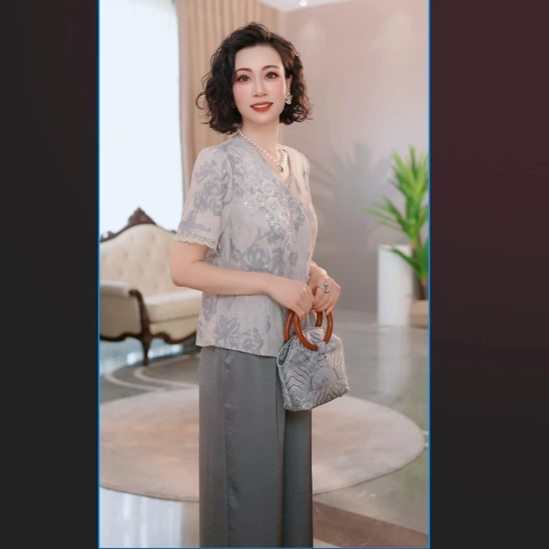 中年妈妈春装时尚套装2025新款气质中老年女装宽松两件套上衣裤子