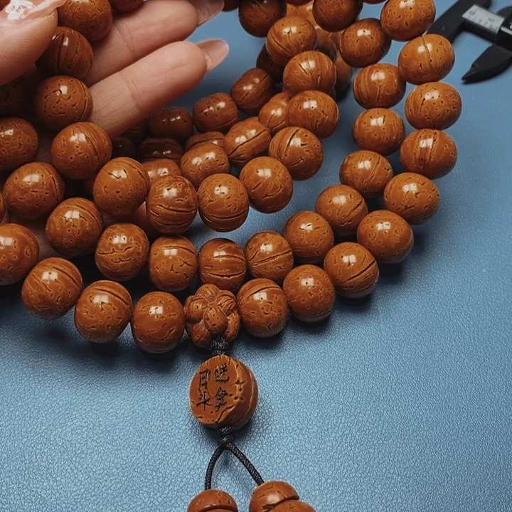 桃核脖挂算盘17花皮色差66颗