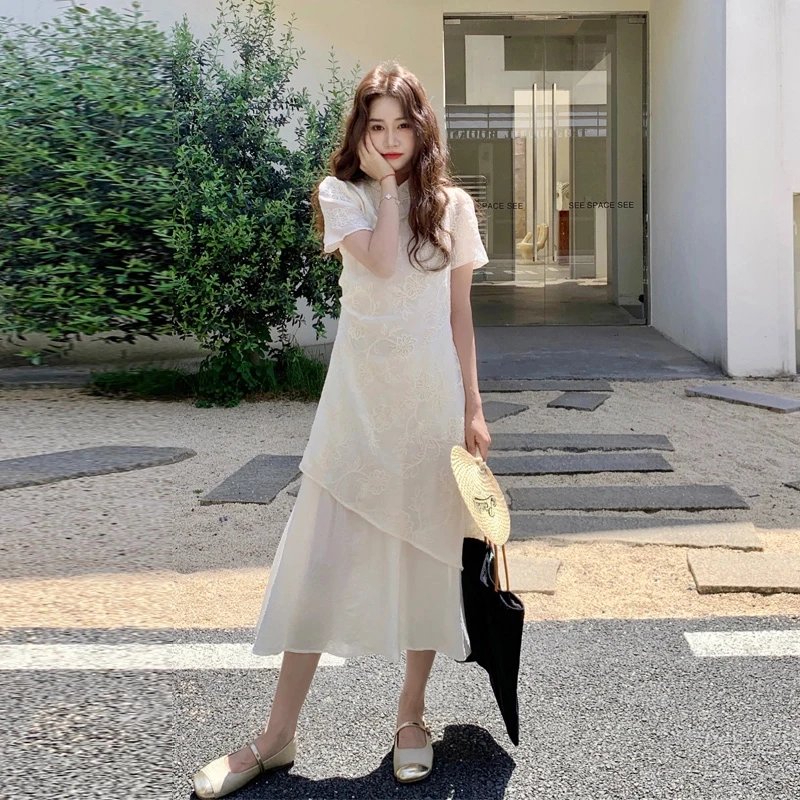 新中式国风连衣裙夏季女2025新款温柔系暗纹提花刺绣不规则鱼尾裙