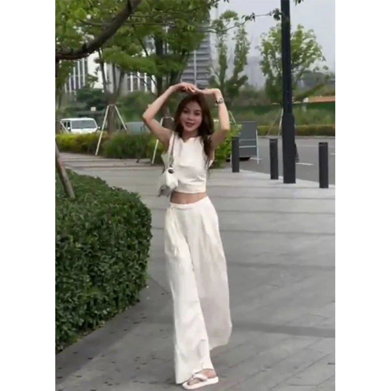 高级感杏色小众两件套装2025早春新款无袖短款露背上衣宽松阔腿裤