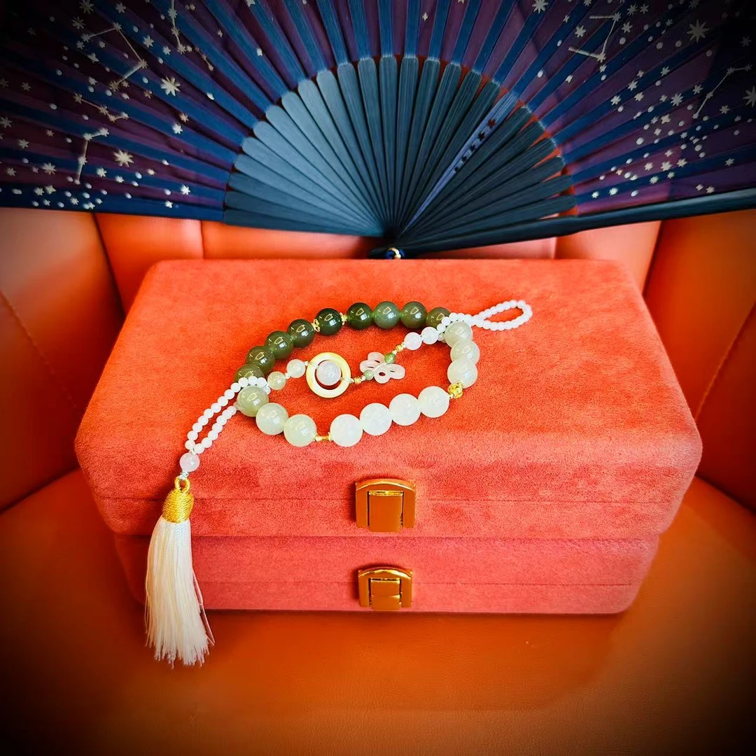 壹屿珠宝     730019    18 k金配件和田玉传世级压襟手串