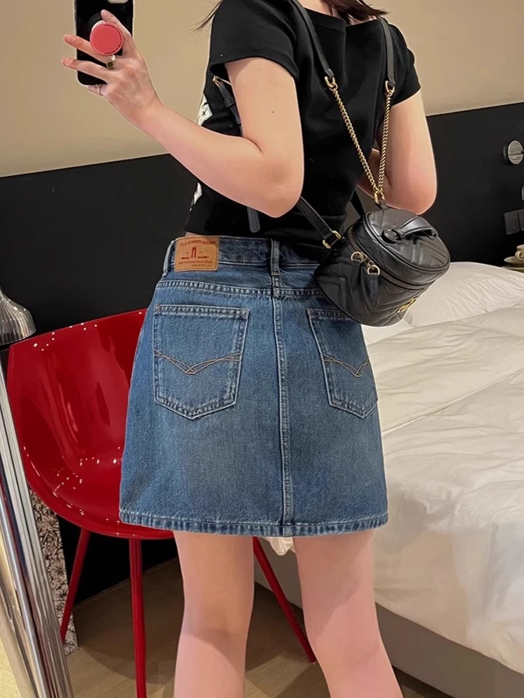 2025设计感牛仔短裙女春夏新款半身裙显瘦高腰复古蓝薄款A字裙