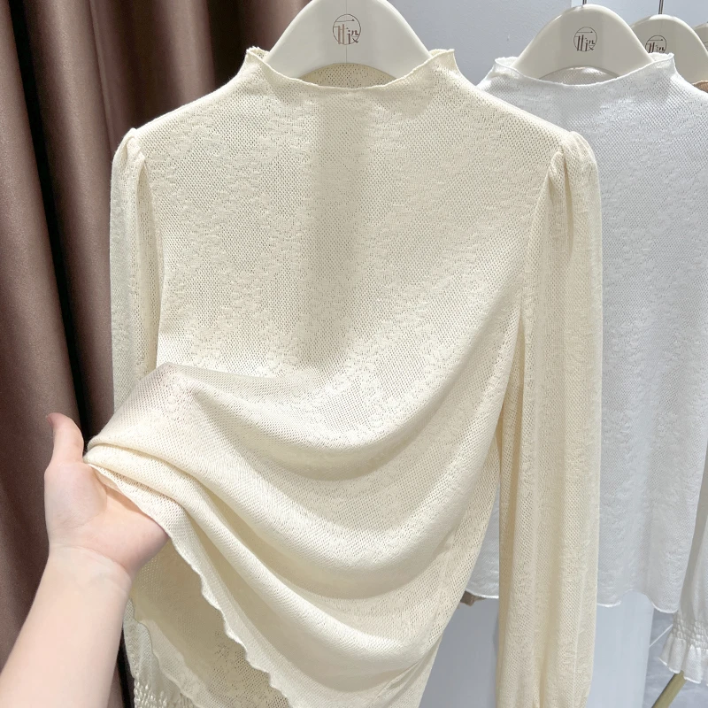 法式杏色轻熟风高级感蕾丝上衣女秋季新款内搭显瘦小高领打底衫