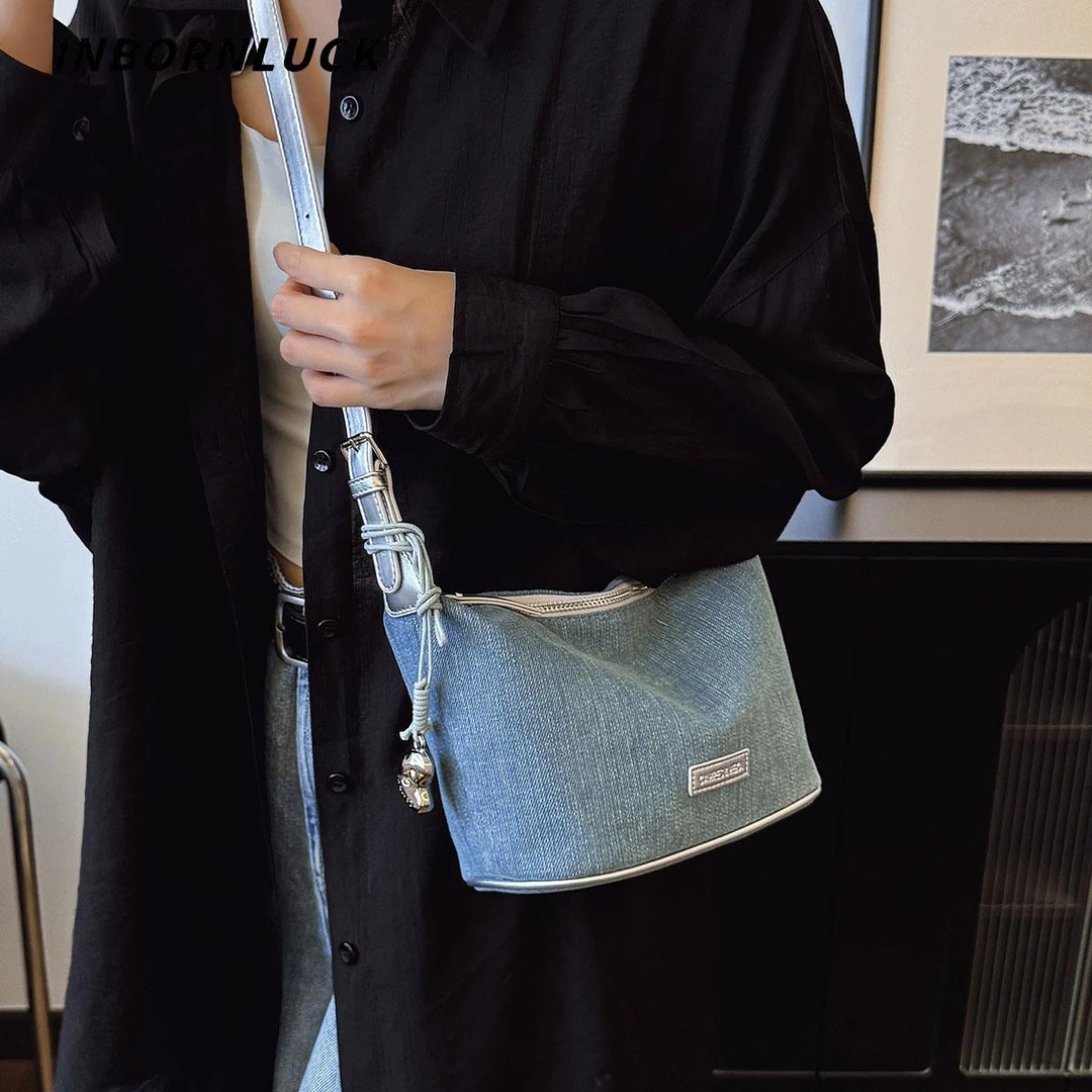 高级感牛仔布饺子包女2025新款小众通勤水桶包休闲百搭单肩斜挎包