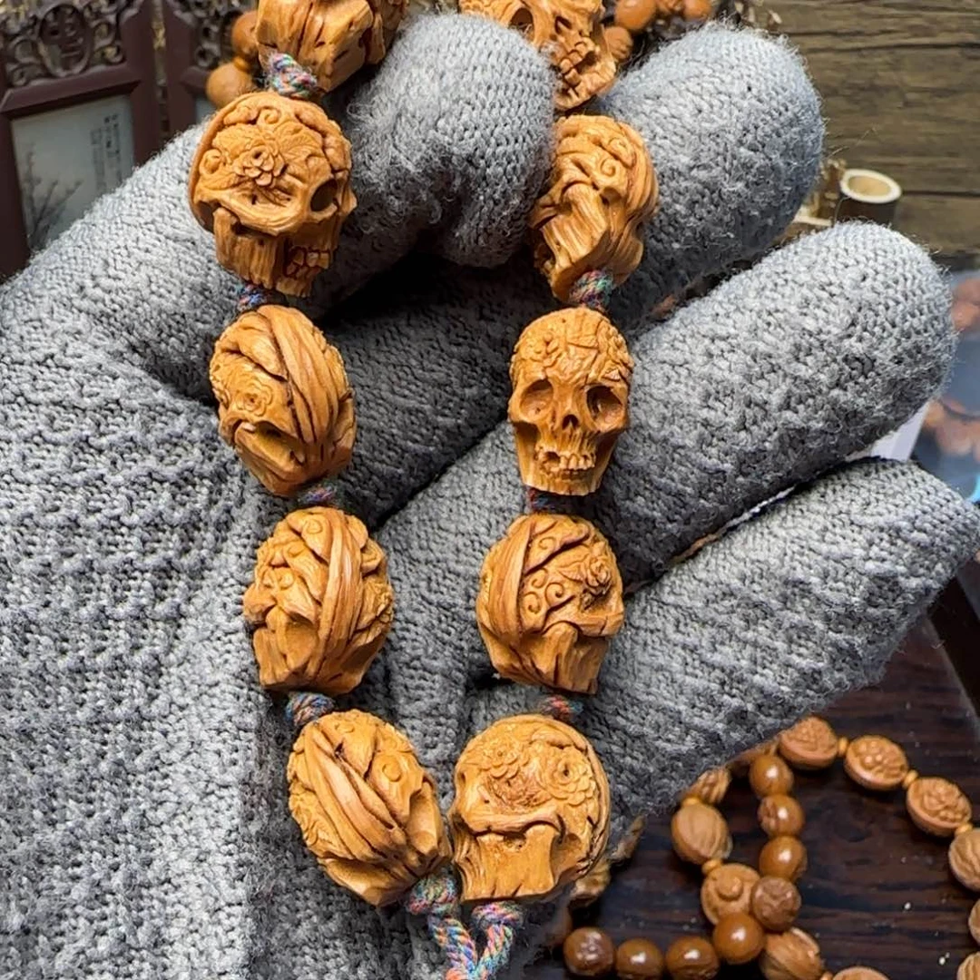 悟***²纯手工雕刻桃核花鬼路路通一物一图