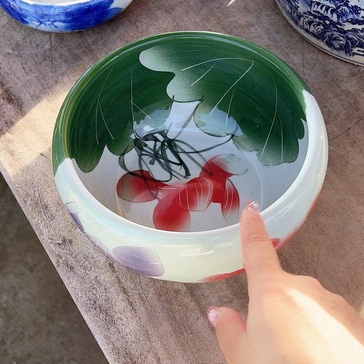 瓷片直径23厘米高13……