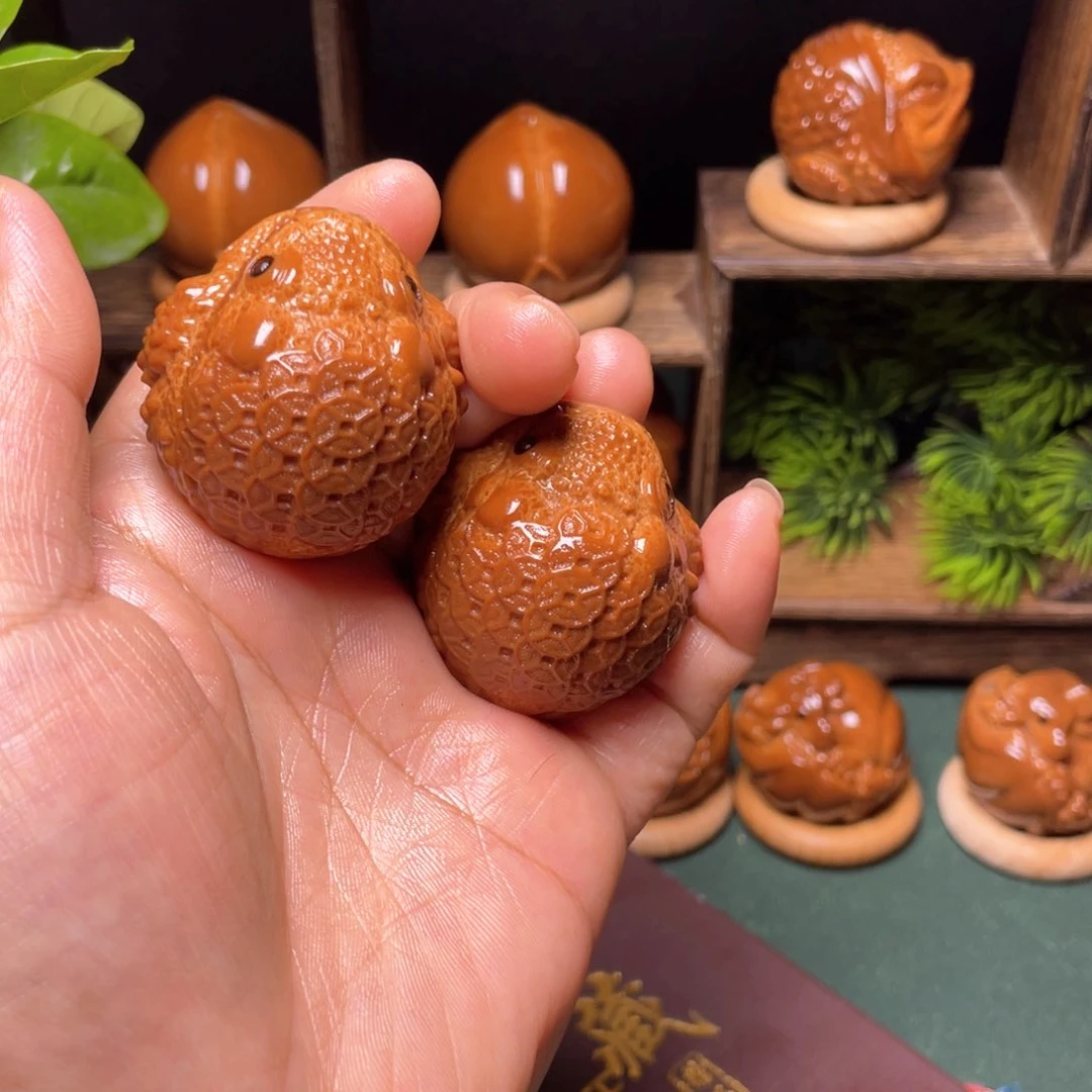 把件橄榄核金币金蟾37一对