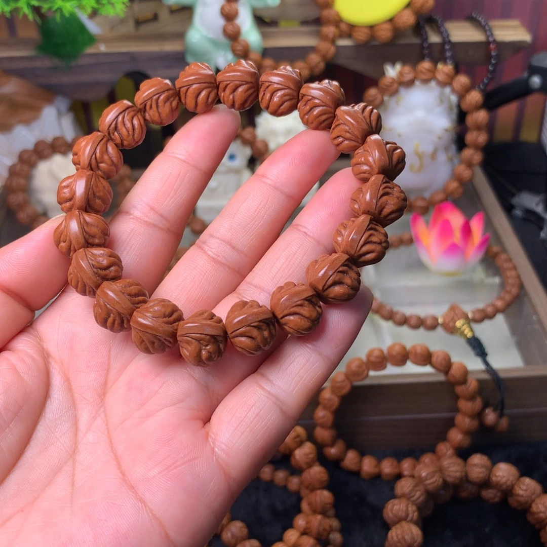 李***️桃核吊坠双脊龙手串15新品