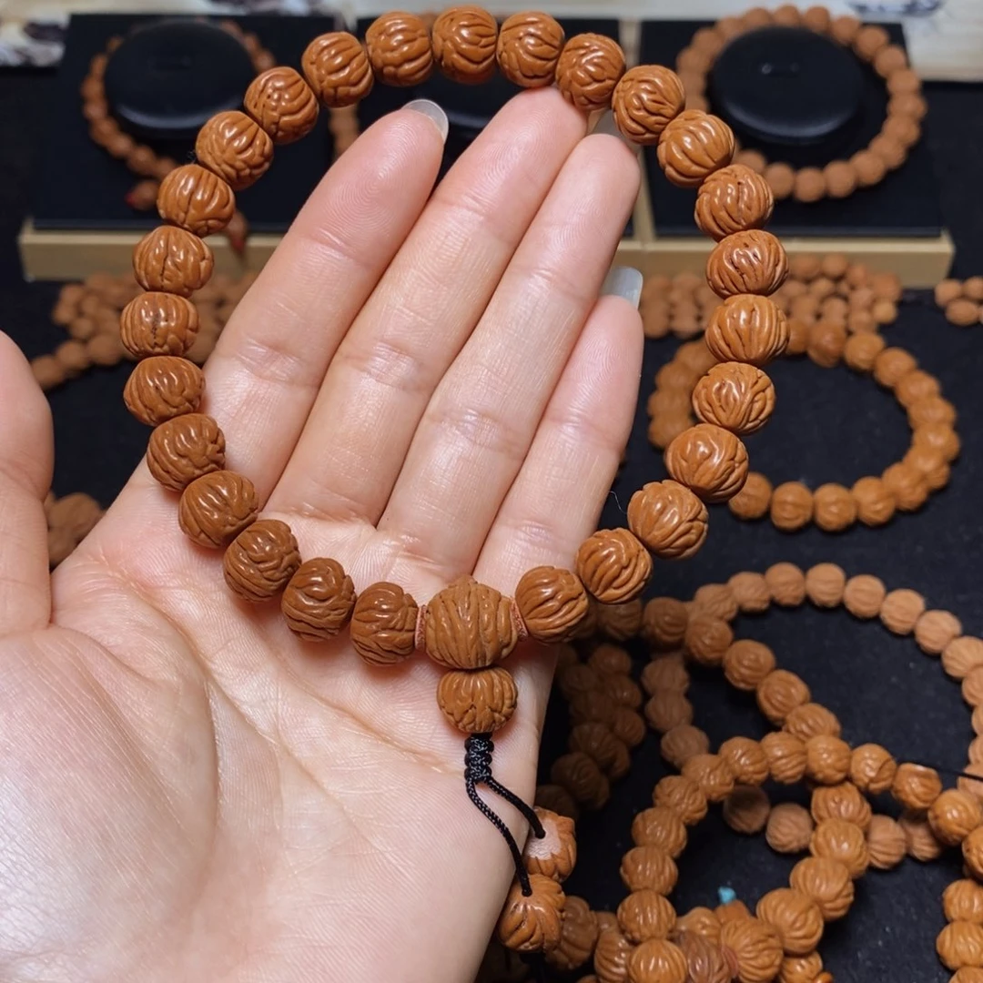 偶***客手串桃核秦岭文玩桃核手持