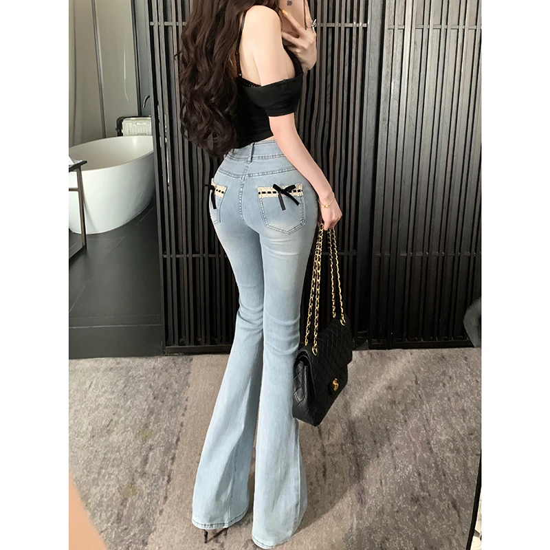 纯欲风少女蝴蝶蕾丝微喇牛仔裤女2025秋季新款高腰丰臀修身长裤