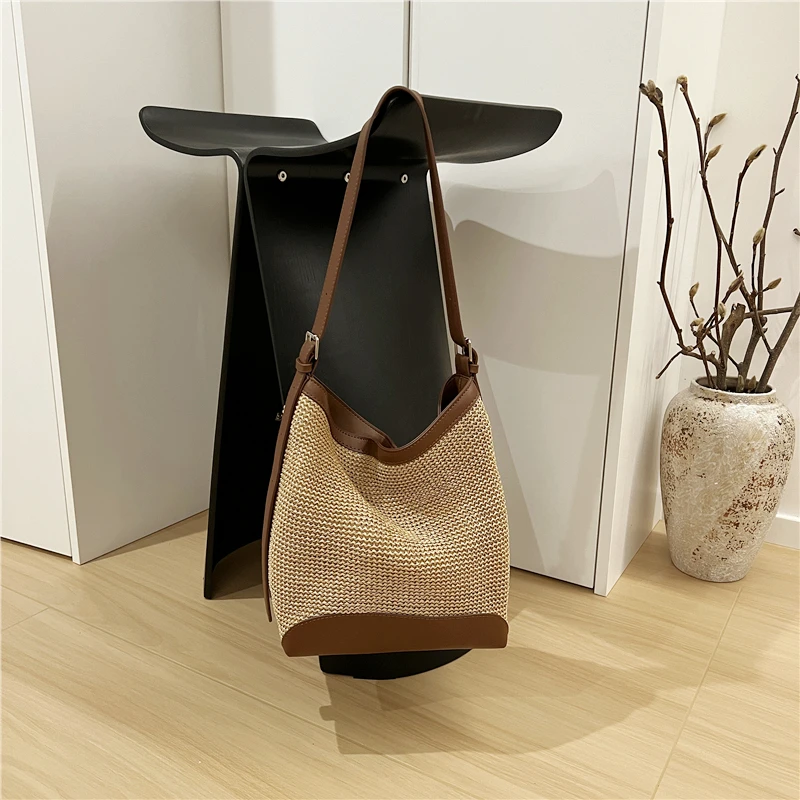 小众夏季新款编织水桶包单肩斜挎包大容量时尚复古草编包
