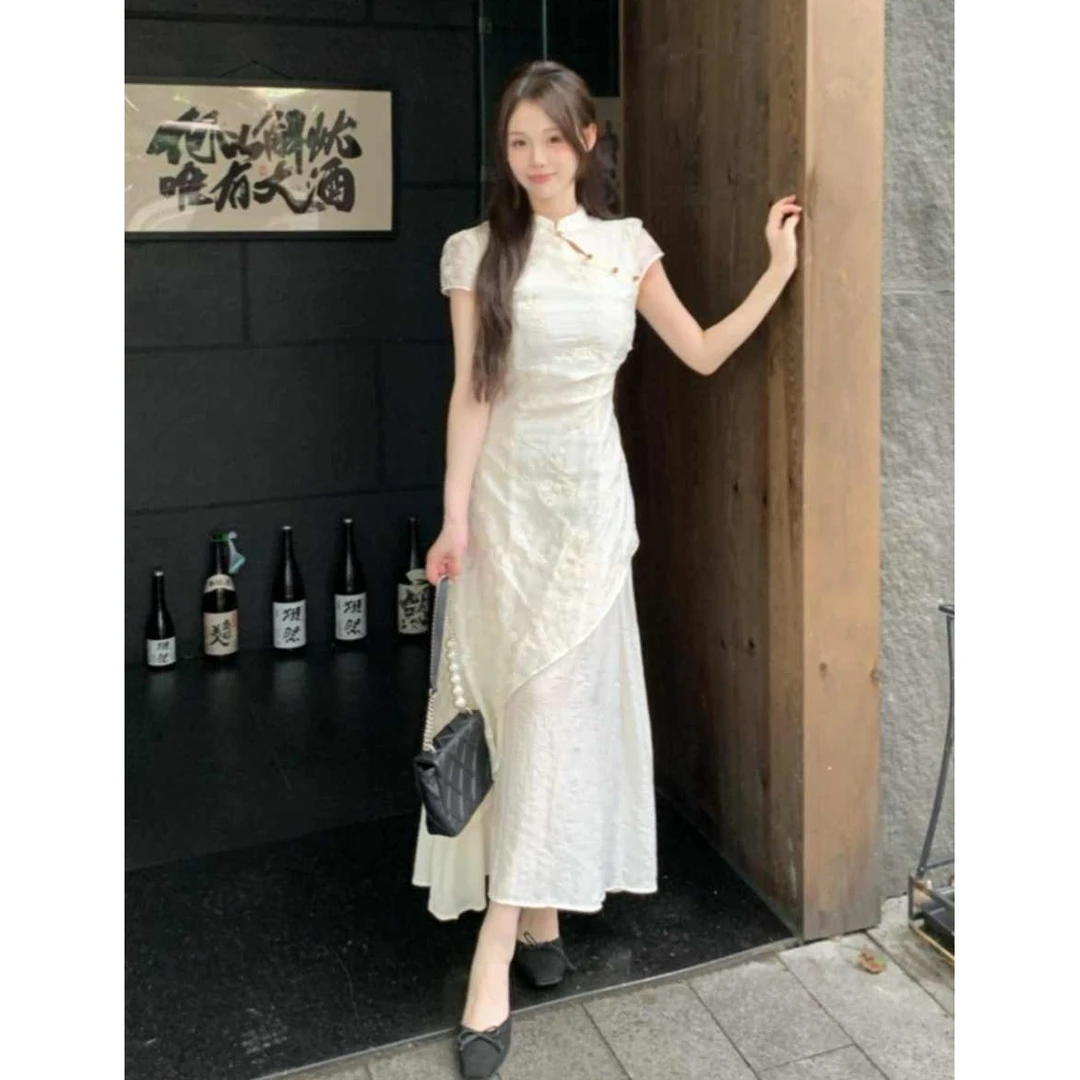 新中式改良提花连衣裙女夏季气质国风立领不规则收腰显瘦A字长裙