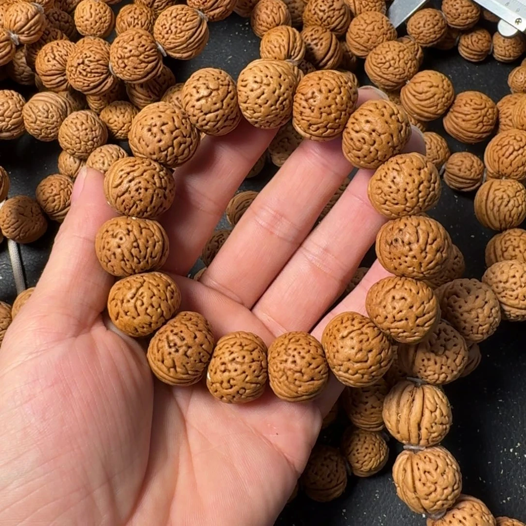 我***光吊坠桃核苹果园手串