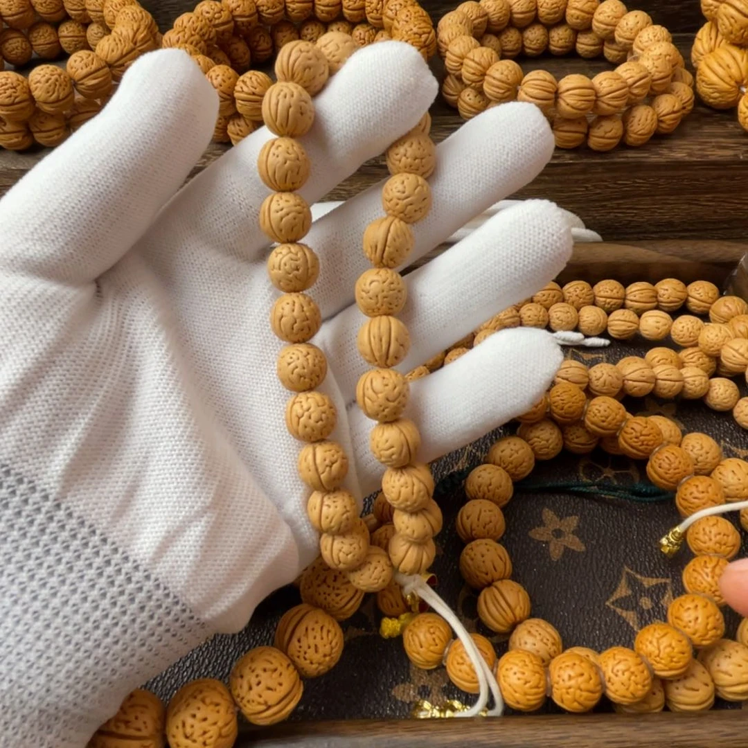 吊坠桃核野生小奶豆