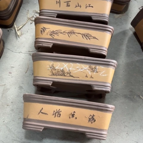 紫砂花盆100-4。