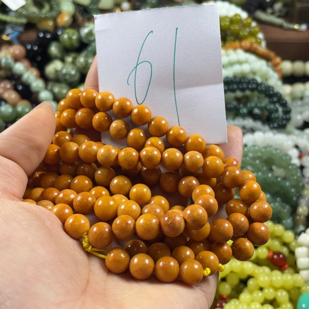 苏***周未镶嵌蛇纹石玉手链