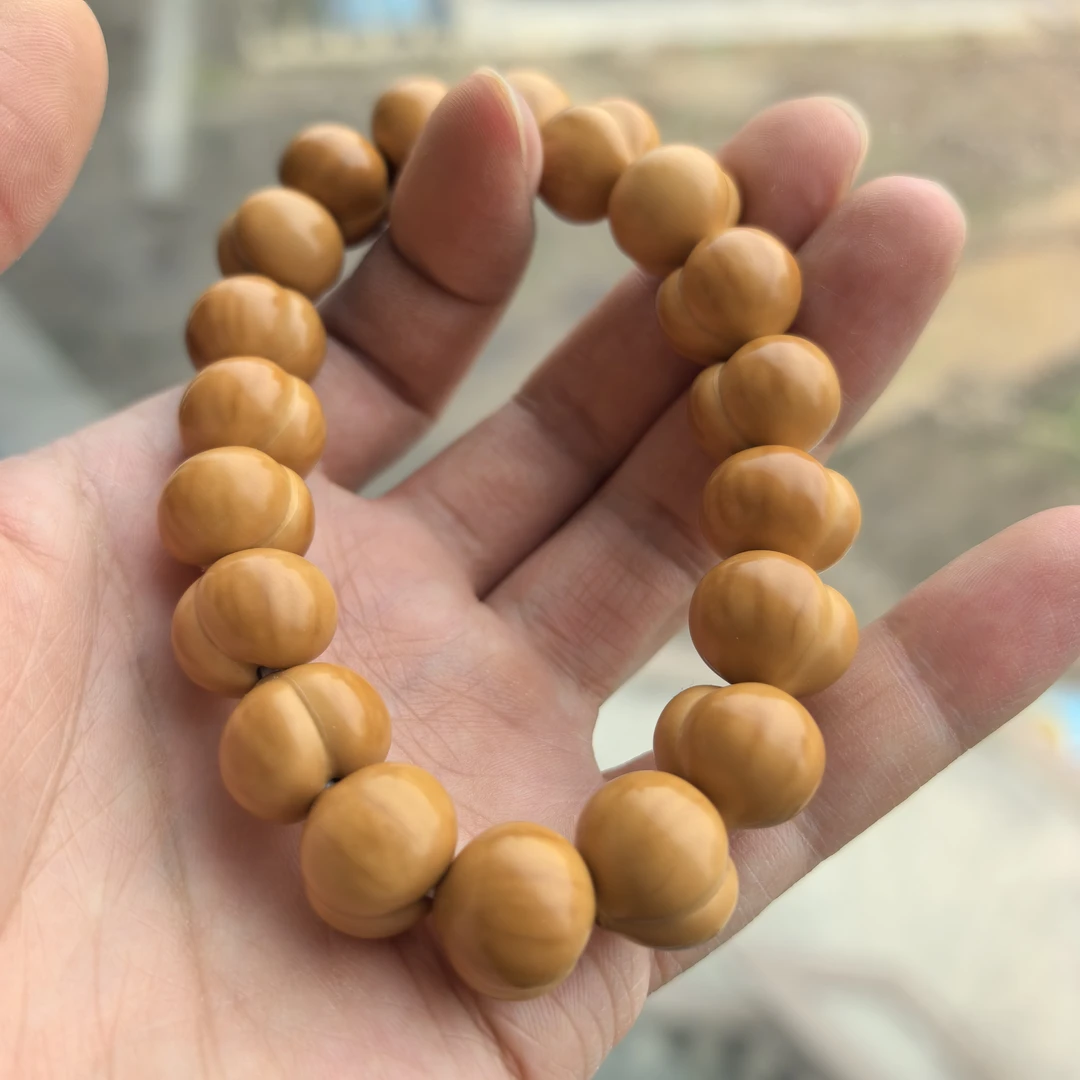 精工雕刻野生屁桃爱心猴头核桃手串男女款手持