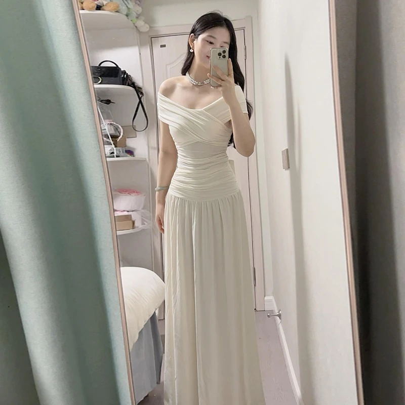 法式白色一字肩连衣裙子女2025新款初夏穿搭气黑色长款修身连衣裙