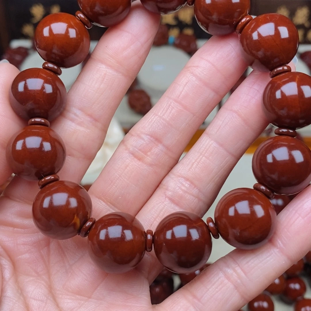 橄榄核吊坠杰*张光珠，