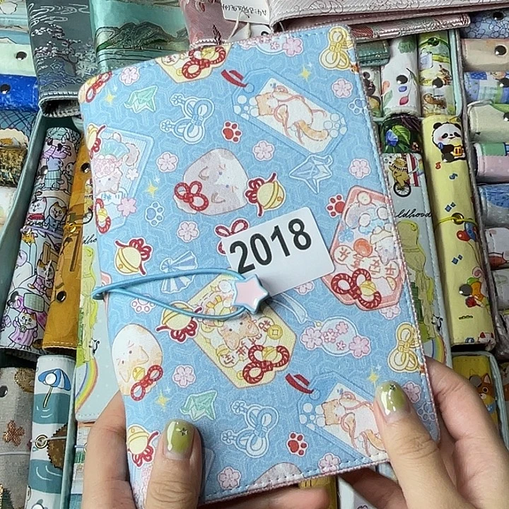 织绣A6活页不送纸+pvc2018