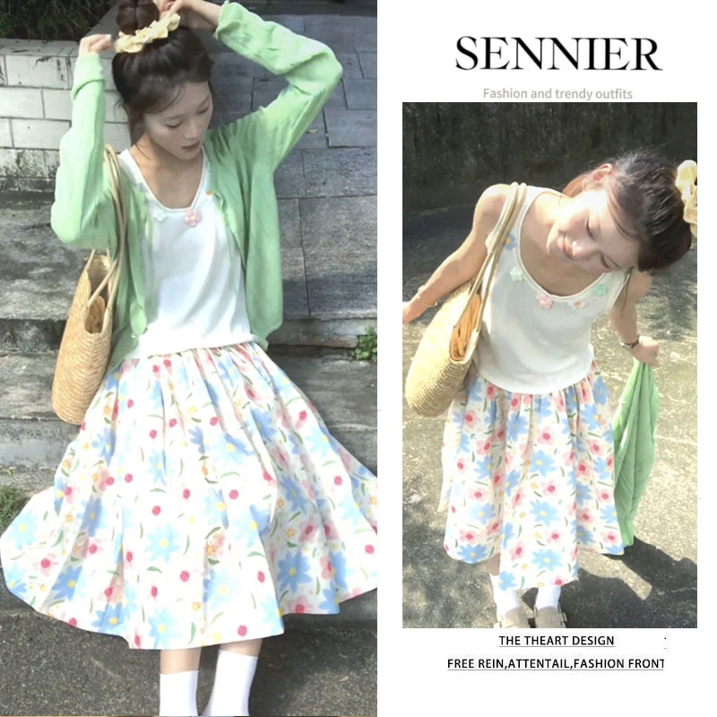 早春温柔系穿搭女2026新款韩系减龄针织衫花朵背心半身裙三件套装