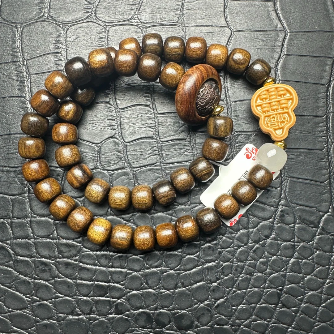 778沉木桶珠手串
