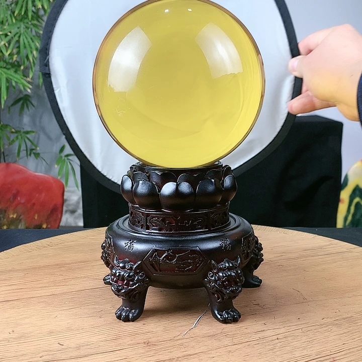 石材黄水晶球直径15带高档底座