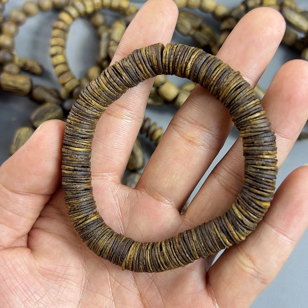 阳****沉香沉香枕奇楠沉香随型药片珠单圈