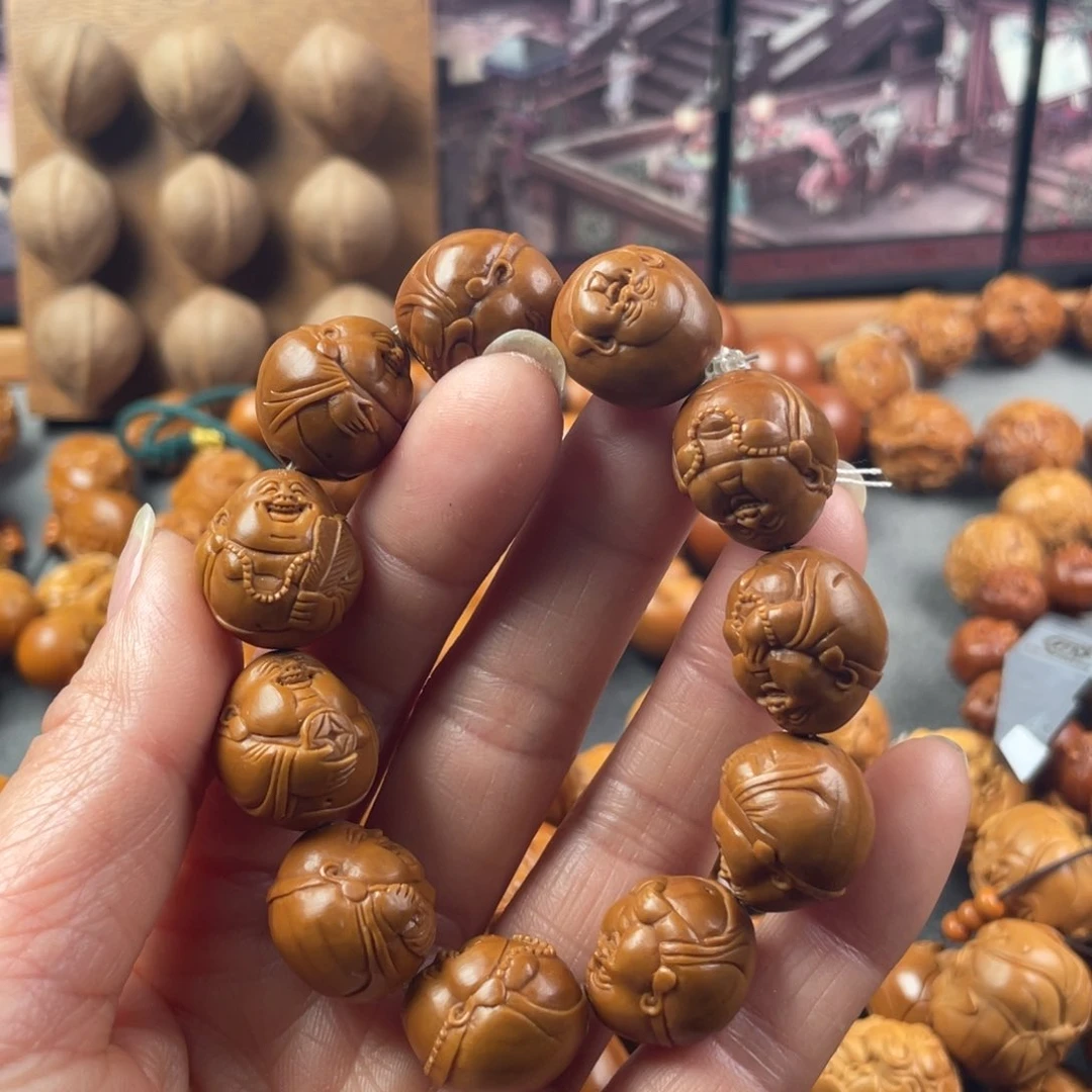 橄榄核手串磊*水晶核弥勒