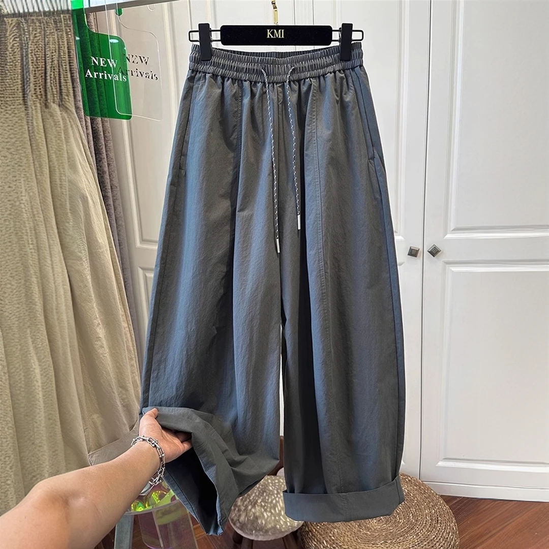 大东门欧货灰绿色松紧腰抽绳休闲裤女弯刀裤宽松褶皱气球裤夏薄款