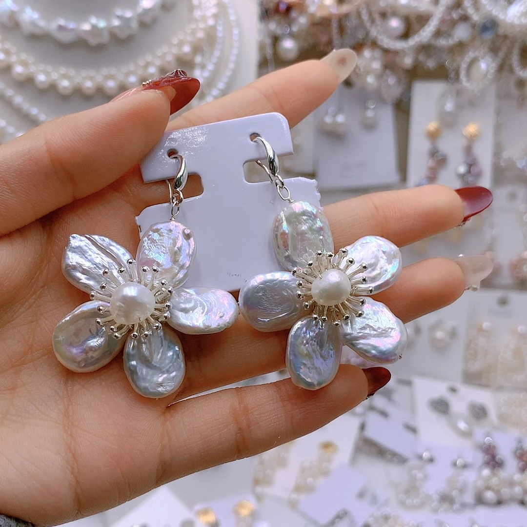 银S925镶嵌耳饰淡水珍珠氧*?