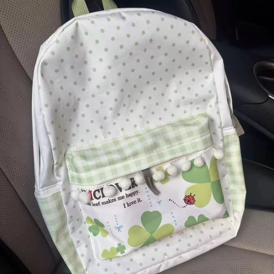 日系自制甜美可爱四叶草波点小绒球波点清新绿色大容量学生双肩包