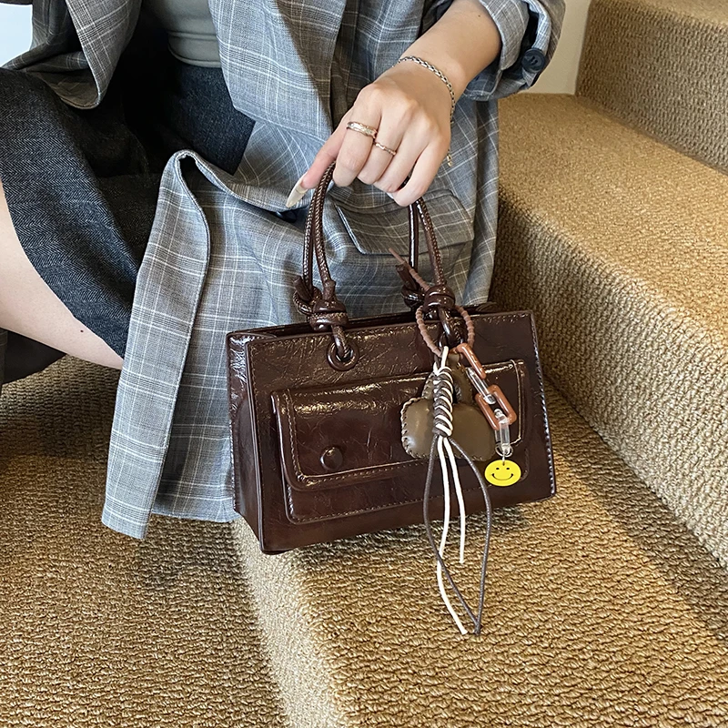 时尚简约手提包2025新款洋气休闲单肩包韩版小众气质通勤斜挎包女