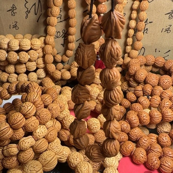 阳***媚桃核吊坠桃核手持