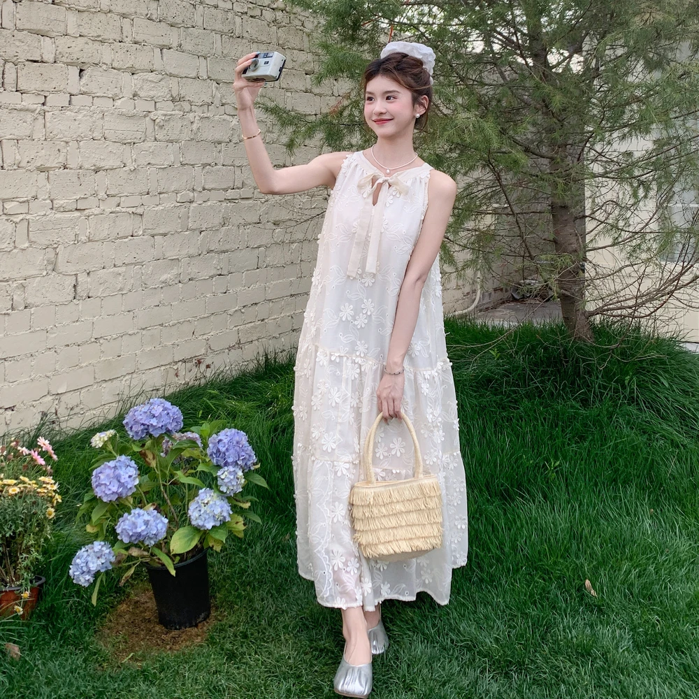 法式高级感立体提花蝴蝶结吊带连衣裙女2025夏季新款度假风长裙子
